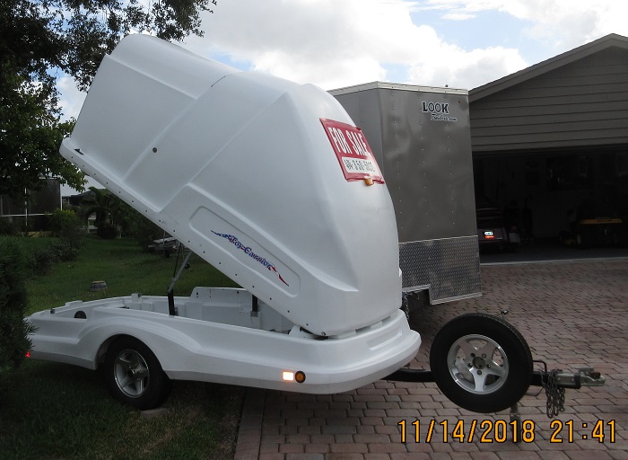 For Sale: Clam shell type trailer. Easy to tow. Weighs 760 lbs. Fits in your garage. Will email spec sheet. 